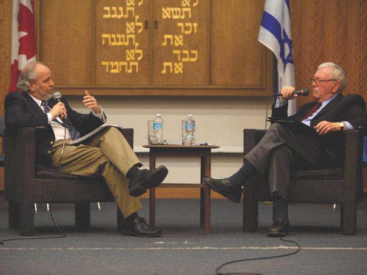 Two men in detente, sitting in chairs