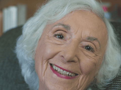White-haired woman head shot