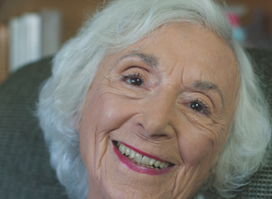 White-haired woman head shot