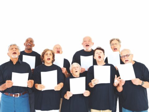 group of choristers against white background