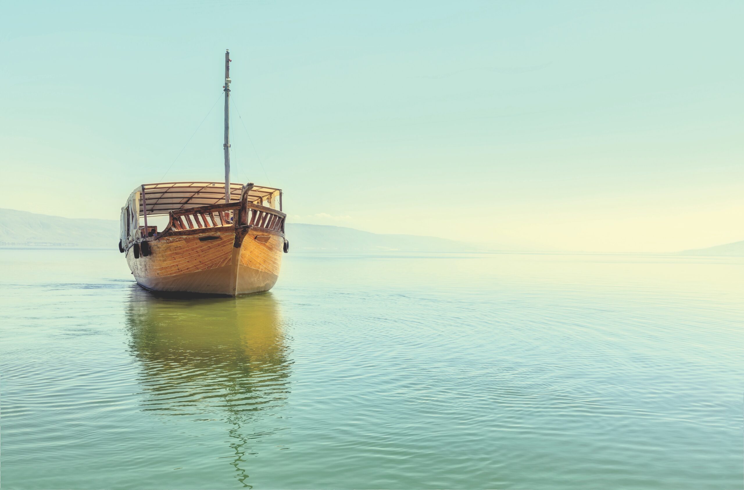 small wooden shop on calm sea