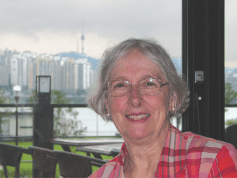 grey-hair woman with glasses