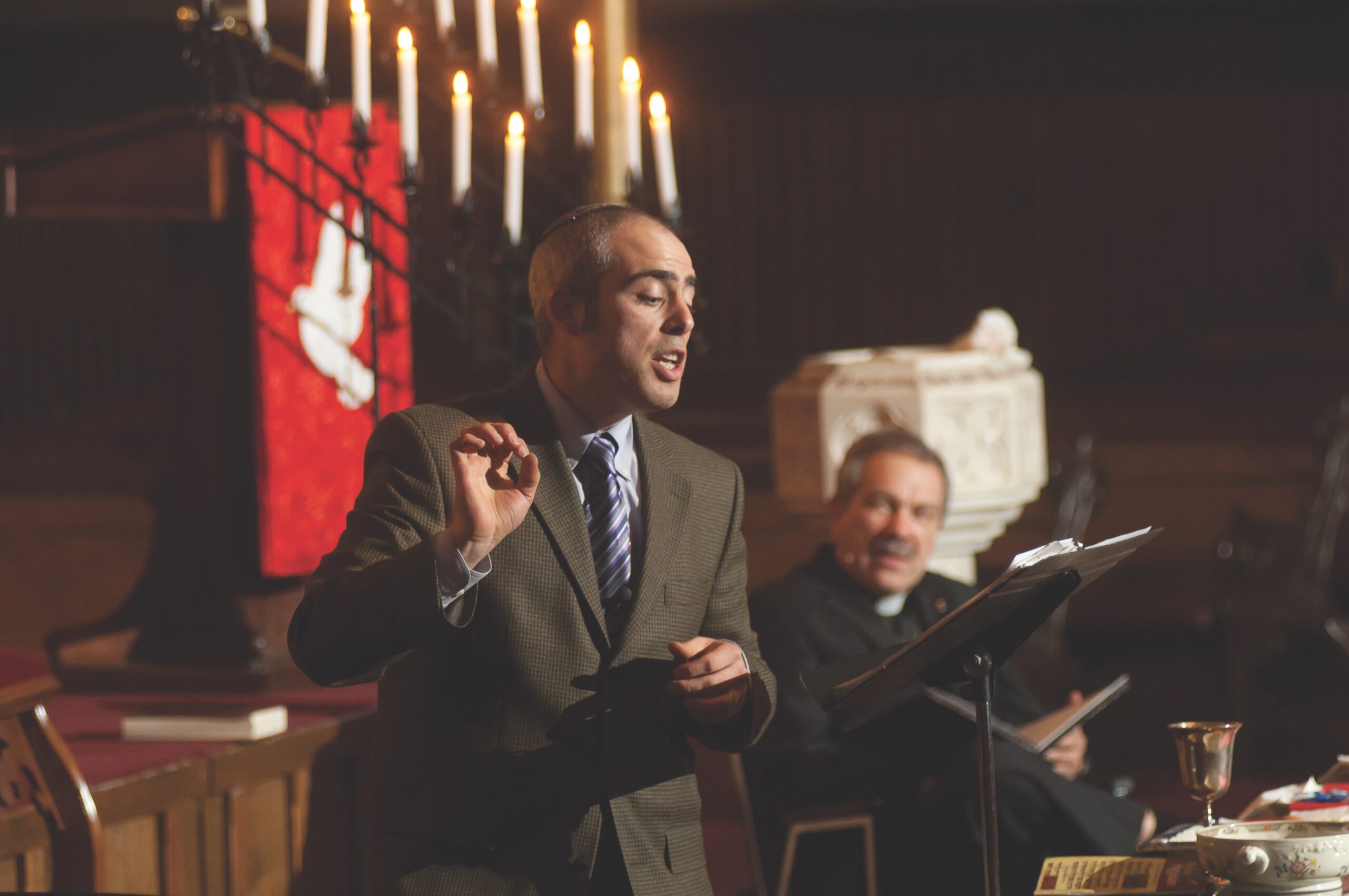 Man in suit singing
