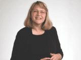 White woman in black shirt