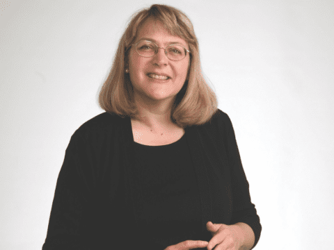 White woman in black shirt