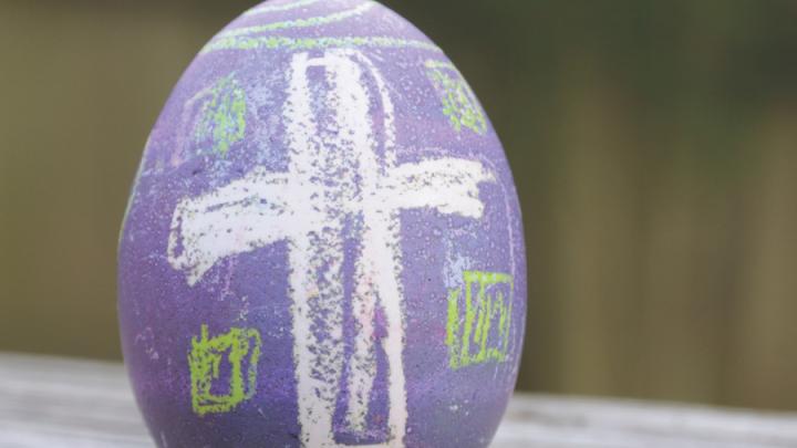 purple easter egg with crayon cross