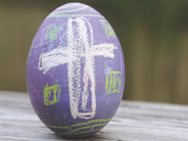 purple easter egg with crayon cross