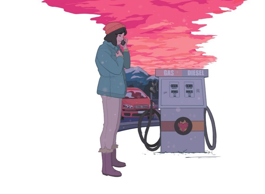 Showcasing the award winning image where a girl with an orange beanie is standing talking on a cell phone with a slight smile on her face, she stands near a gas pump at a gas station.