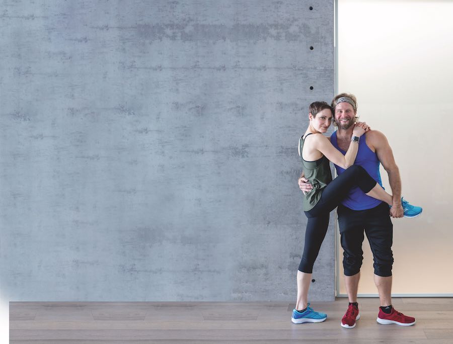 The Amazing Race Canada winners, Catherine Wreford and Craig Ramsay posing in workout clothes.