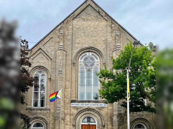 Norwich United church with pride flag
