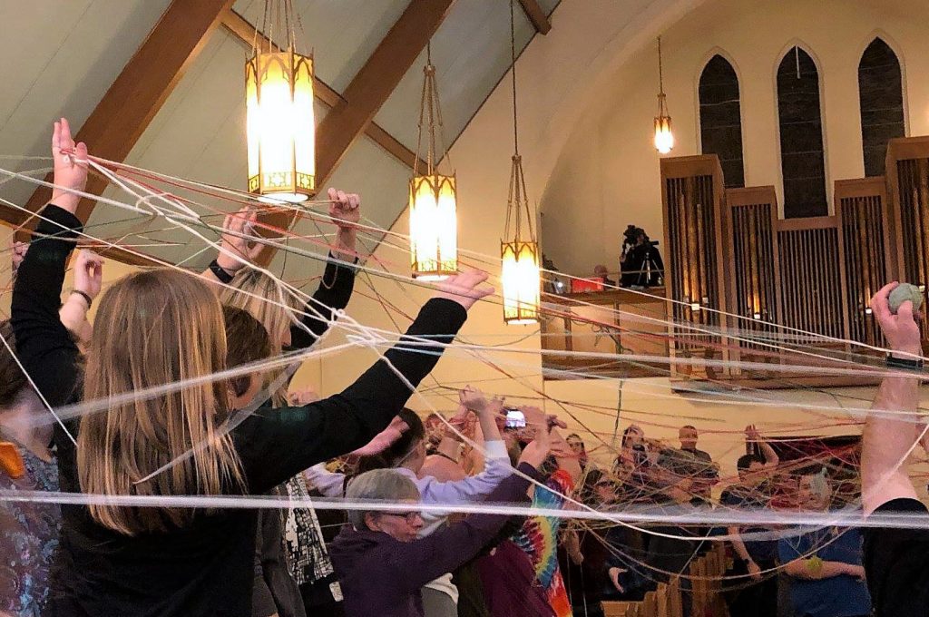 Determined knitter turns tangled yarn into communion tablecloth