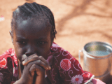 Black girl at refugee camp in South Sudan