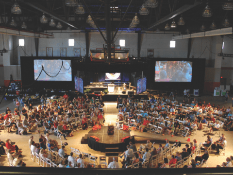 Gathering of many people at a meeting, viewed from above