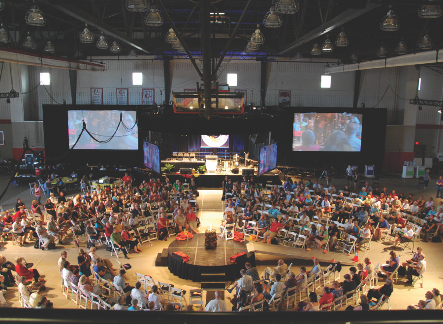 Gathering of many people at a meeting, viewed from above