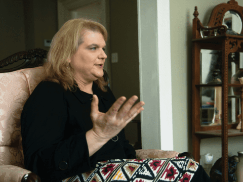 Woman sitting on chair speaking