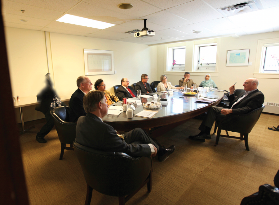 Group of people sitting around a table
