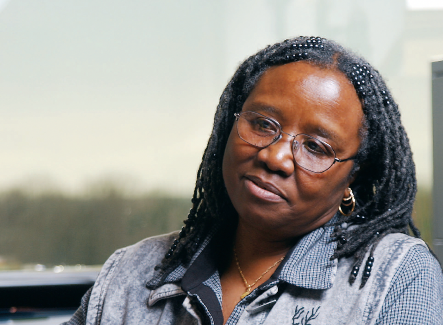 Young Black woman in blue shirt