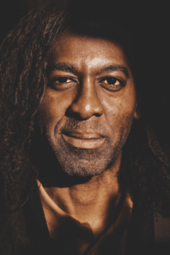 Up close headshot of a Black man's face
