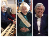An image of three centenarian individuals: On the left, Ray Mackay seated at an organ wearing a dark sweater; in the center, Molly Austen smiling and wearing a celebratory sash reading "Aged to Perfection" and a crown; on the right, Miriam Tees wearing a purple cardigan and speaking in front of a dark background.