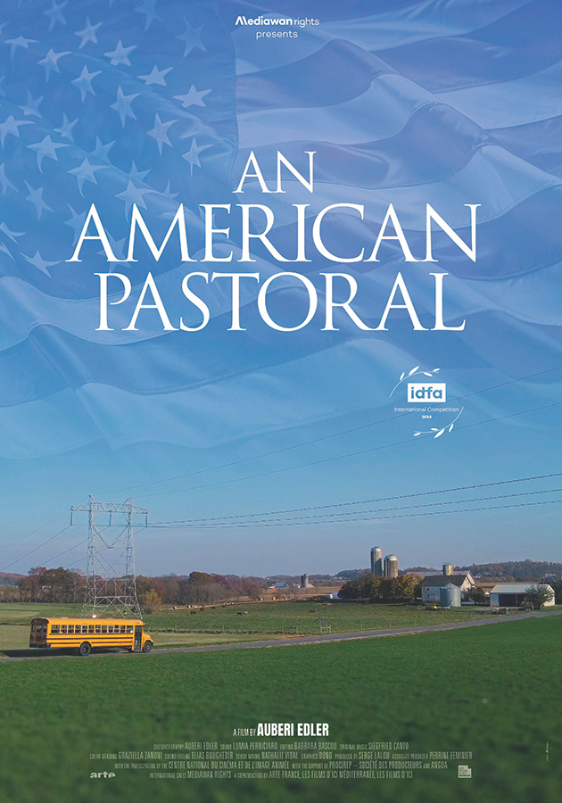 Film poster of An American Pastoral. It features a blue sky on a small town road. There is a yellow school bus on the road and a white building.