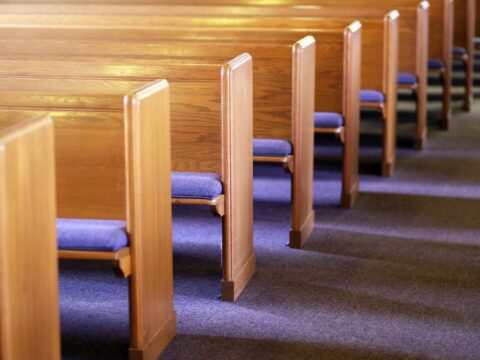 Empty pews in a church sanctuary